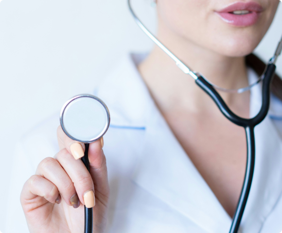 Photo of doctor holding a stethoscope.